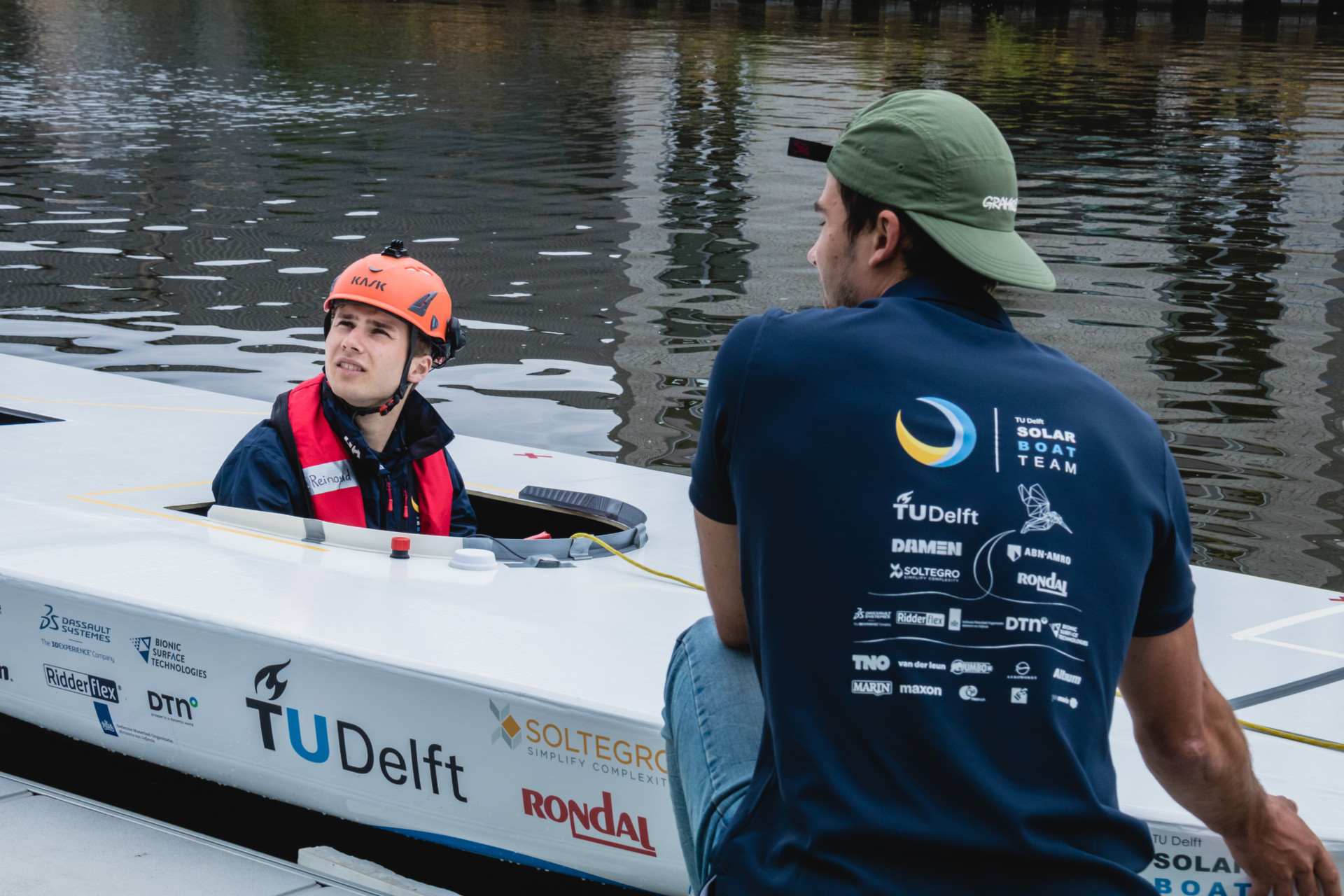 8-Pilot-close-up-during-mooring-first-wet-test-TU-Delft-Solar-Boat-Team-2020
